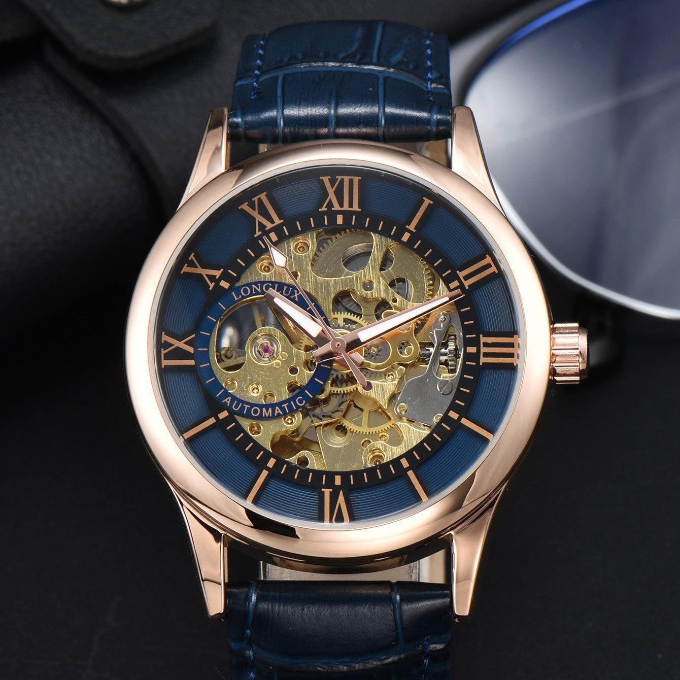 rose-gold-shell-blue-surface