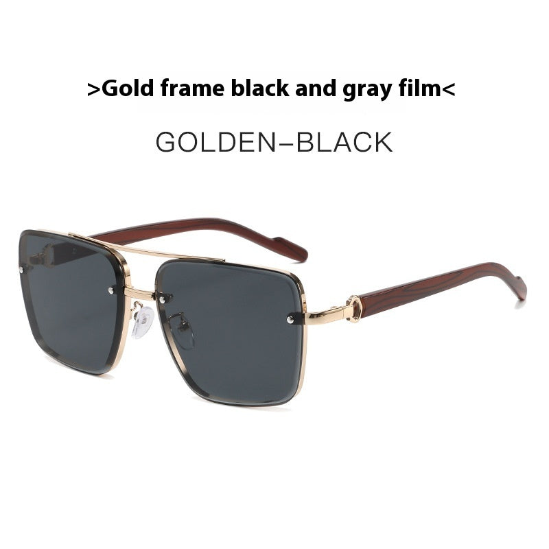 gold-frame-black-and-grey-lens