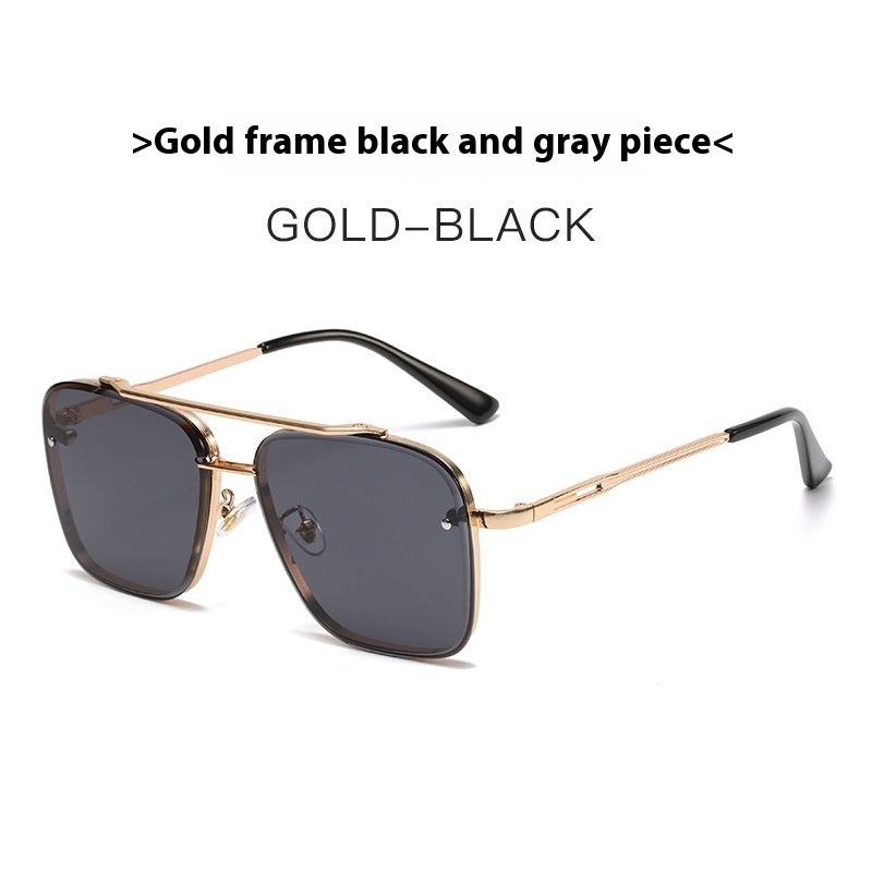 gold-frame-black-and-grey-lens
